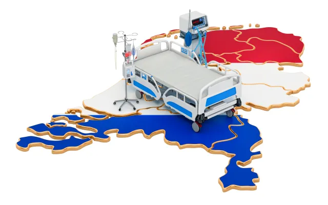 Plattegrond van Nederland in rood-wit-blauw. Bovenop staat een ziekenhuisbed.
