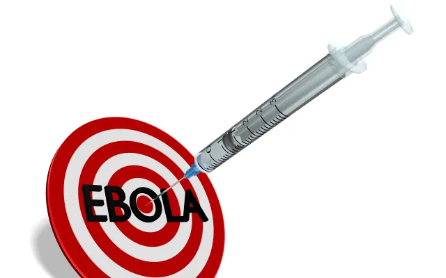 Foto: Emilia_Szymanek/iStock.com Dartbord met injectiespuit als pijl