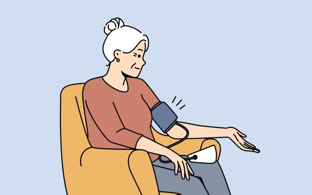 Illustratie van een oudere vrouw zittend in een fauteuil met een bloeddrukmeter om haar linkerarm.