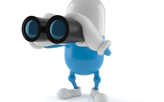 Foto: Talaj/shutterstock Minion die door een verrekijker kijkt