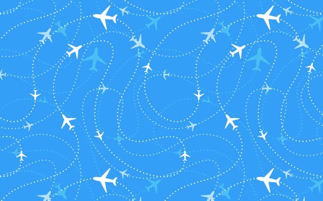 Een blauwe lucht met rondzwermende vliegtuigen