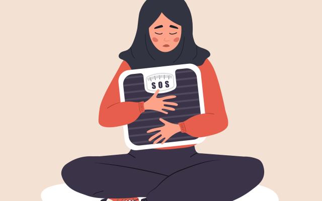 Een trieste vrouw die een weegschaal in haar armen heeft