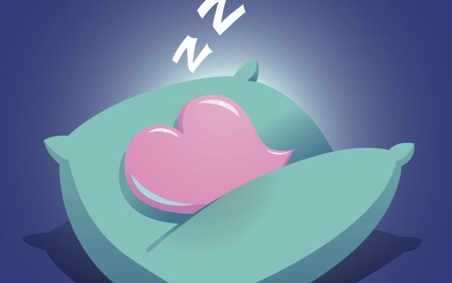 Illustratie van een slapend hart op een kussen