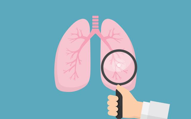 Illustratie van longen met een vergrootglas ervoor