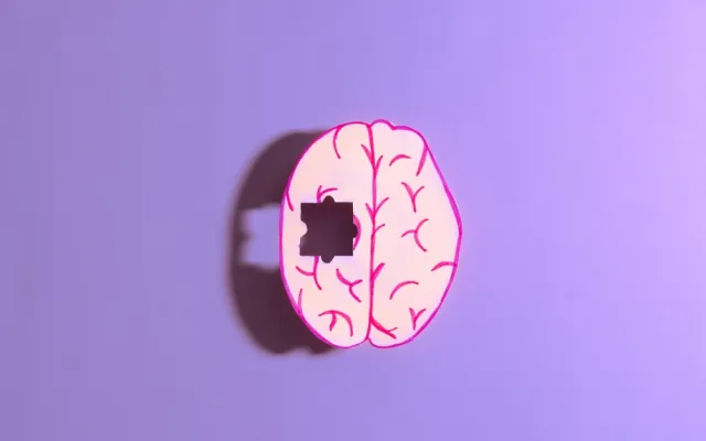 Hersenen met uitsnede van puzzelstuk