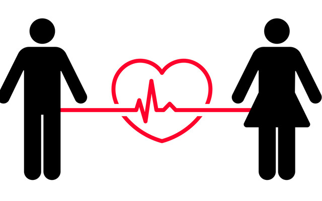 Illustratie van man & vrouw met hart ertussen