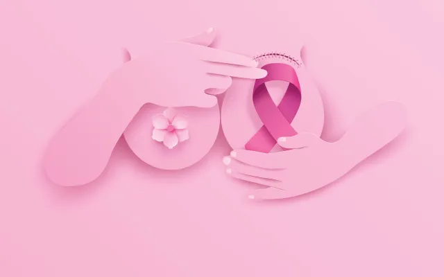 Beeld; KENG MERRY Paper Art/Shutterstock Illustratie van een borst met het Kankerlintje erop
