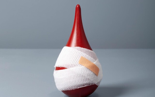 Illustratie: Druppel bloed met verbandje eromheen