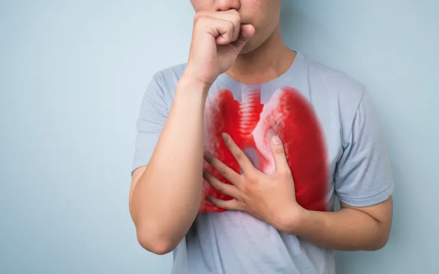 Hoestend persoon met illustratie van rode longen