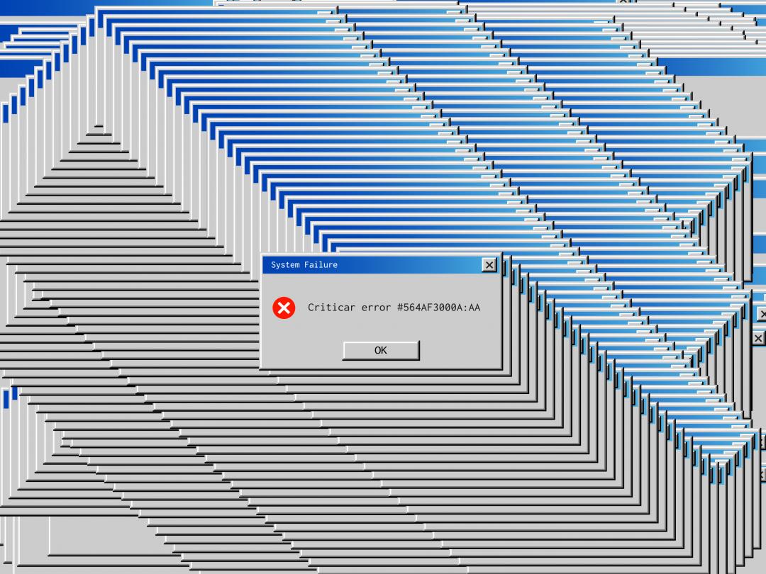 Printscreen van een vastgelopen computerscherm met een foutmelding,