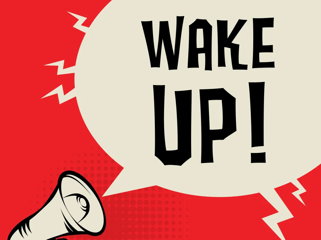 Illustratie in stripboekstijl van een arm die een luidspreker omhoog houdt. Uit de luidspreker komt een spreekballon met de woorden "Wake up!".