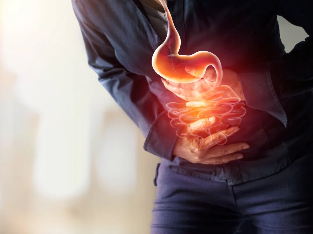 Persoon met buikpijn