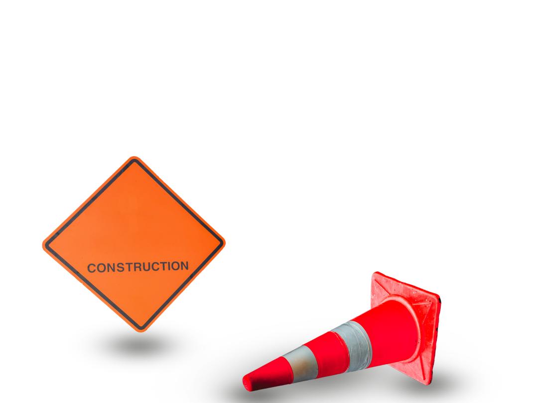 Een verkeerbord voor werkzaamheden en een piloon