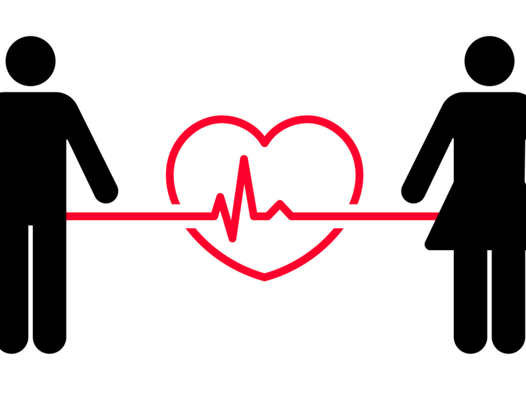 Illustratie van man & vrouw met hart ertussen