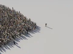 Een massa mensen in de vorm van een pijlpunt.