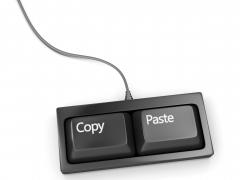 Twee zwarte toetsenbord toetsen met de woorden "Copy" en "Paste".
