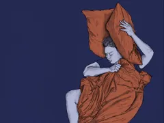 Iemand die in bed ligt